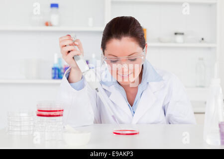Cute scientist preparing a sample Stock Photo
