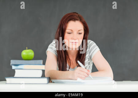 Young student taking notes Stock Photo