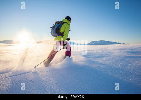 Snowshoe walker on Rodtinden, Kvaloya, Tromso, Troms, Norway Stock Photo