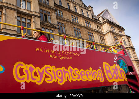 UK, England, Wiltshire, Bath, foreign visitors on top deck of open topped sightseeing bus Stock Photo