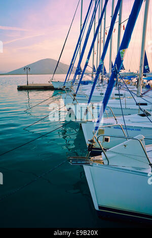 Flotilla Sailing - Moored yachts all in a line. Stock Photo