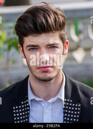 A portrait of a young man with deep blue eyes Stock Photo