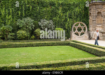 partial view of the garden of hotel de sully, place de vosges, marais district, paris, ile de france, france Stock Photo