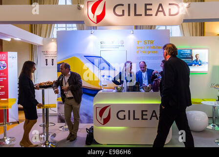 Paris, France. Medical Trade Show, Congress of SFLS, French Society in FIght against AIDS, N.G.O's, and Drug Companies. Gilead Scene Pharmaceuticals Corporation Stall, international people in meeting, pharma industry, hiv aids medication, medical conference center Stock Photo