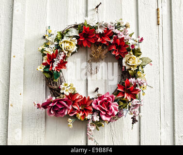 decorative  wreath on a country church door Stock Photo