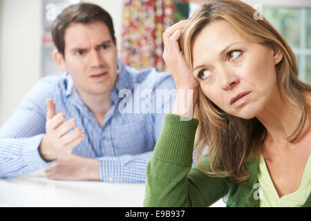 Couple Having Arguement At Home Stock Photo