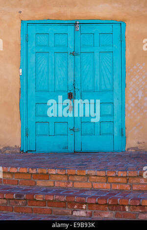 Turquoise blue doors of Old Town Emporium; Albuquerque, New Mexico. Stock Photo