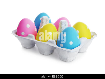multicolored Easter eggs in the cardboard box isolated on  white background Stock Photo
