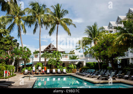 Key West Florida,Keys Westin Key West Resort & Marina,hotel hotels lodging inn motel motels,swimming pool area,lounge chairs,palm trees,visitors trave Stock Photo