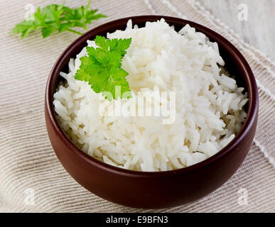 Organic boiled brown rice on bowl isolated in white background Stock ...