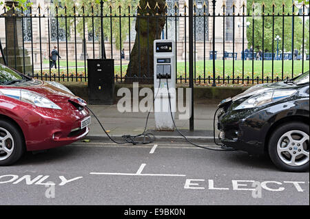 nissan leaf electric car charging in a Birmingham city center street