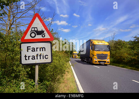 lorry passing sharp bend warning sign for half a mile ahead yorkshire united kingdom Stock Photo