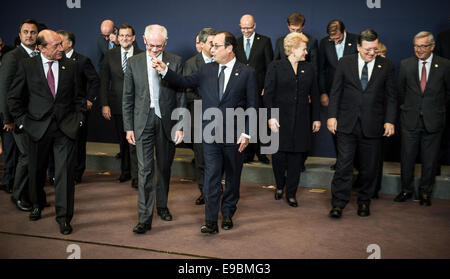 Brussels, Belgium. 23rd Oct, 2014. EU leaders President of Romania Traian Basescu, Herman Van Rompuy, the president of the European Council, French President Francois Holland after they pose during the group photocall at the EU Summit at the EU Council headquaters in Brussels, Belgium on 23.10.2014 The two-day summit of the European Council in Brussels will focus on an ambitious package of climate change targets for 2030 but also tackle the Ebola crisis, economic stagnation, concern over Ukraine and tension in Cyprus over Turkey. by Wiktor Dabkowski/picture alliance © dpa picture alliance/Alam Stock Photo