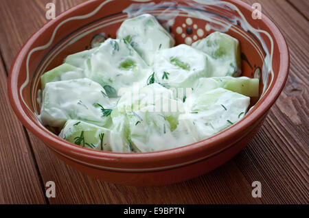 Mizeria - traditional Polish cucumber salad with sour cream Stock Photo