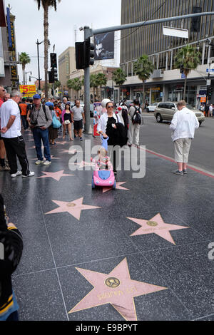 Hollywood Walk of fame and the characters Stock Photo
