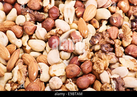 Mixture of almonds, hazelnuts, walnuts, cashews and pistachios. Stock Photo
