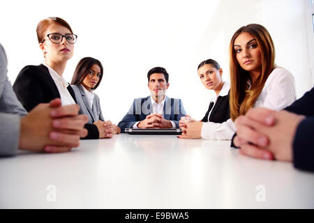 Businesspeople sitting at the table on a meeting Stock Photo