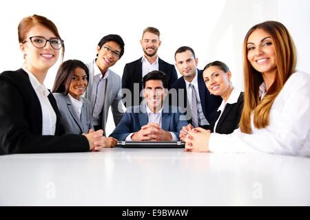 Group of a smiling colleagues in office
