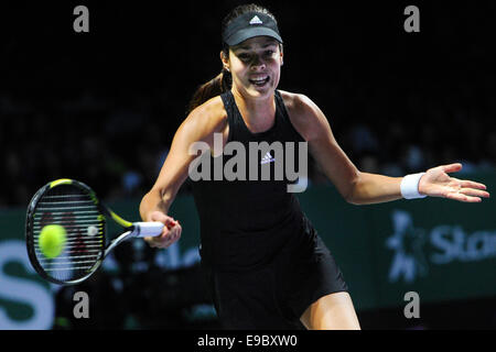 Singapore. 24th Oct, 2014. Serbia's Ana Ivanovic returns the ball during the round robin match against Romania's Simona Halep at the WTA Finals at the Singapore Indoor Stadium, Oct. 24, 2014. Credit:  Then Chih Wey/Xinhua/Alamy Live News Stock Photo
