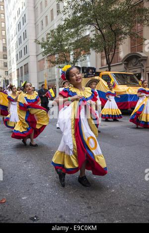 Hispanic Day Parade on 5th Avenue in New York City. Child dancers represent Columbia at the parade. Stock Photo