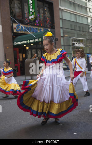 Hispanic Day Parade on 5th Avenue in New York City. Child dancers represent Columbia at the parade. Stock Photo