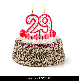 Birthday cake with burning candle number 29 Stock Photo