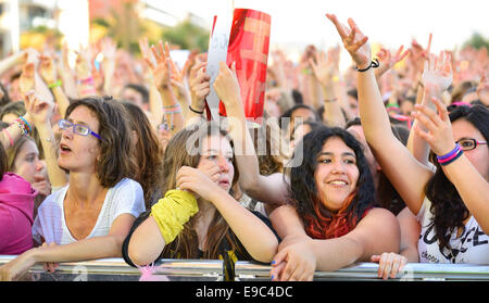 BARCELONA - MAY 23: Girls from the audience at the Primavera Pop Festival of Badalona on May 18, 2014 in Barcelona, Spain. Stock Photo
