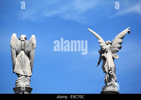 Statues of two small angels inside the Recoleta monumental cemetery. Buenos Aires, Argentina. Stock Photo