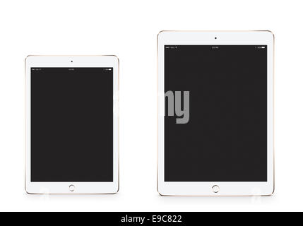 Tablets iPad mini 3 iPad air 2 gold with blank screen, digitally generated artwork. Stock Photo