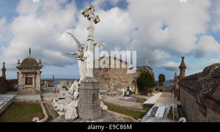 Panoramic composition of Comillas cemetery. Art nouveau sculptures of Llimona. Cantabria,Spain. Stock Photo