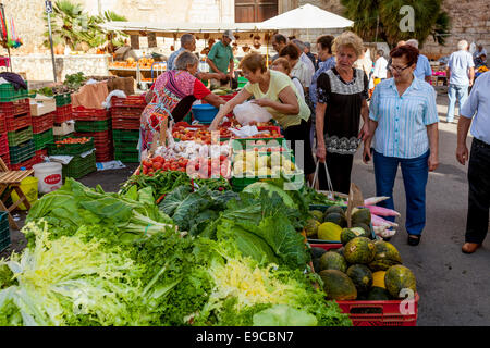 Local Women Buying Fruit and Vegetables At The Thursday Market In Inca, Mallorca - Spain Stock Photo