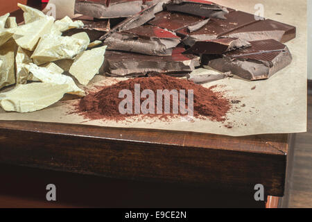 Pieces of cocoa butter and chocolate bar Stock Photo