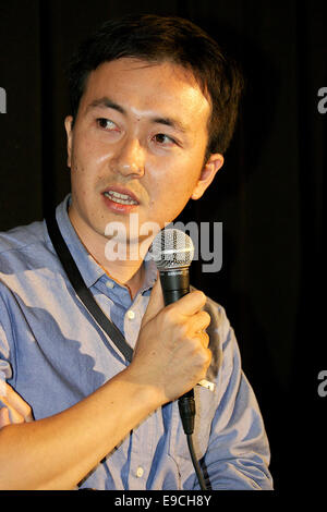 Tokyo, Japan. 24th Oct, 2014. Shingo Ohuchi, October 24 2014, Tokyo, Japan : Director Shingo Ohuchi speaks to the audience during the stage greeting of the movie 'Unknown Town' at TOHO CINEMAS (Roppongi) on October 24, 2014 in Tokyo, Japan. The 27th Tokyo International Film Festival which is the biggest cinematic festival in Tokyo has been held from October 24 to 31. Credit:  Aflo Co. Ltd./Alamy Live News Stock Photo
