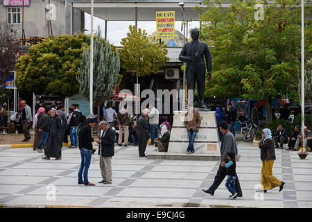 TURKEY, Suruc,10 km away from syrian border and from IS Islamic state besieged town Kobane, syrian refugees at Ataturk statue Stock Photo