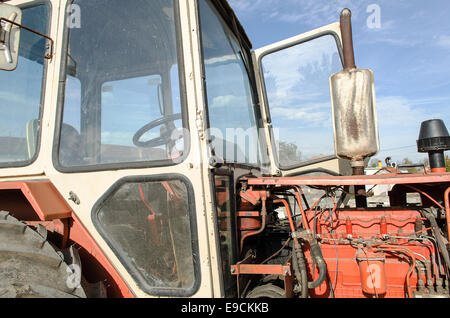 Old farm tractor may be still in use, but very rusty Stock Photo