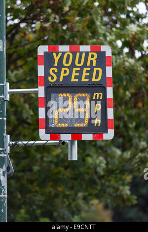 Speed Indicator Device (SID) in Kent on a 30 mph mile per hour stretch of road: it displays speed of approaching car / vehicle. Stock Photo