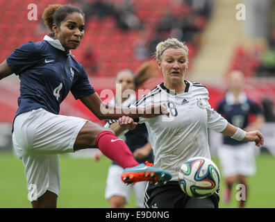 Offenbach, Germany. 25th Oct, 2014. France's Laura Georges (L) and Alexandra Popp (R) in action during the women's soccer international match between Germany and France in Offenbach, Germany, 25 October 2014. Photo: FRANK RUMPENHORST/dpa/Alamy Live News Stock Photo