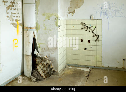 empty room in an old destroyed factory building Stock Photo