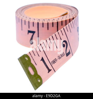 Tailors tape measure cut out on a white background. Yellow