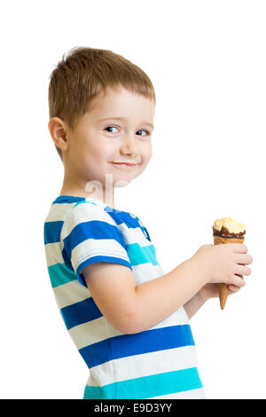 happy kid boy eating icecream in studio isolated Stock Photo