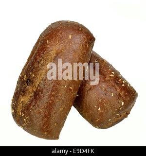 Two large Pumpernickel rolls on a white background. Stock Photo