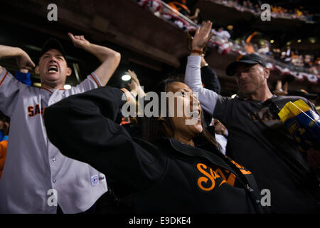 Oct. 25, 2014 - San Francisco Giants fan Michelle Harger celebrates when Pablo Sandoval singles to center allowing Gregor Blanco and Buster Posey to score during the bottom of the sixth inning of Game 4 of the World Series at AT&T Park in San Francisco, Calif. on Saturday Oct. 25, 2014. (Credit Image: © Andrew Seng/Sacramento Bee/ZUMA Wire) Stock Photo