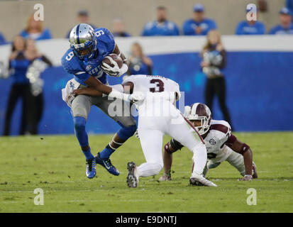 Oct. 25, 2014 - Lexington, Ky, US - Kentucky's Demarco Robinson (9) was tackled by Jay Hughes (3) in the fourth quarter of the Mississippi State at Kentucky at Commonwealth Stadium in Lexington, Ky., on Oct. 25, 2014. Miss. St. won 45-31. Photo by Pablo Alcala | Staff (Credit Image: © Lexington Herald-Leader/ZUMA Wire) Stock Photo