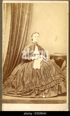 Carte de visite photograph of woman knitting circa 1865 Stock Photo