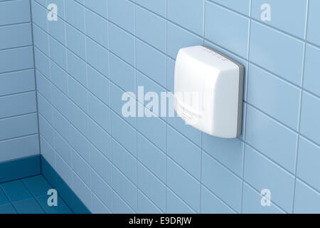 Automatic hand dryer in public toilet Stock Photo