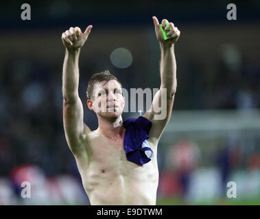 Oct. 22, 2014 - Anderlecht, United Kingdom - Arsenal's Per Mertesacker celebrates at the final whistle..- UEFA Champions League - RSC Anderlecht vs Arsenal - Constant Vanden Stock Stadium - Belgium - 22nd October 2014 - Picture David Klein/Sportimage. Stock Photo