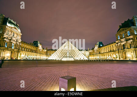 PARIS-DECEMBER 06: The Louvre Art Museum on December 06, 2012 in Paris, France. A central landmark of Paris, over 35000 objects  Stock Photo