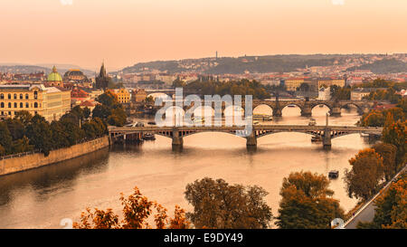 Old bridges of Prague at sunset from Letna park Stock Photo