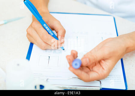 Closeup of a scientist working with samples in lab. Stock Photo