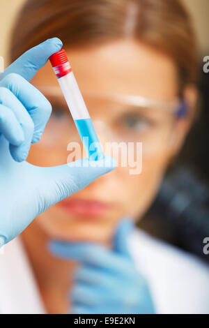 Young beautiful scientist working with samples in lab. Stock Photo